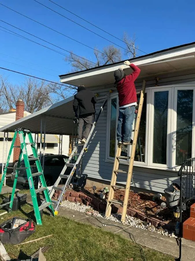 Restoration crew performing exterior repair in Traverse City