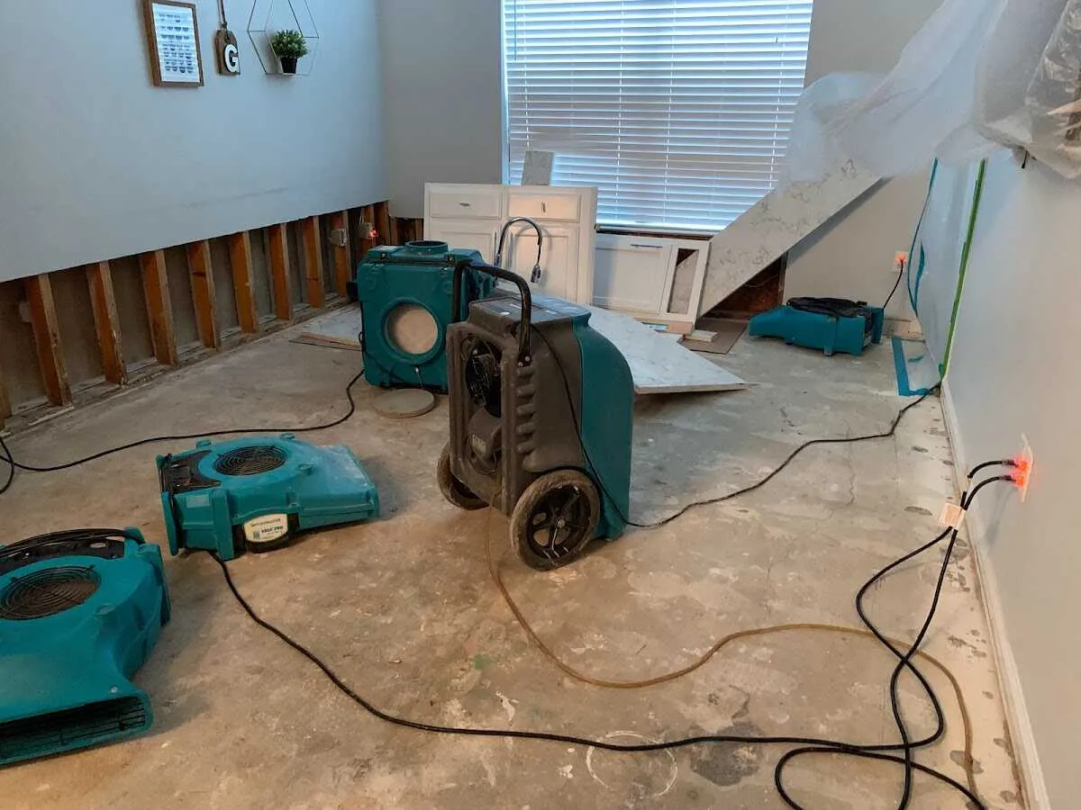 Dehumidifier in flood-cut room for Water Damage Restoration in Traverse City